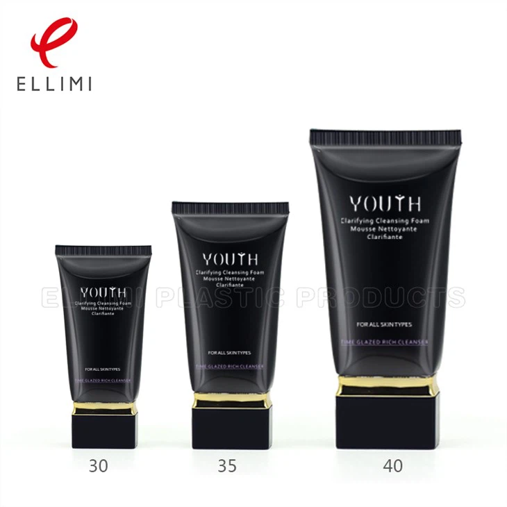 Črne kozmetične tube s kvadratnim pokrovom